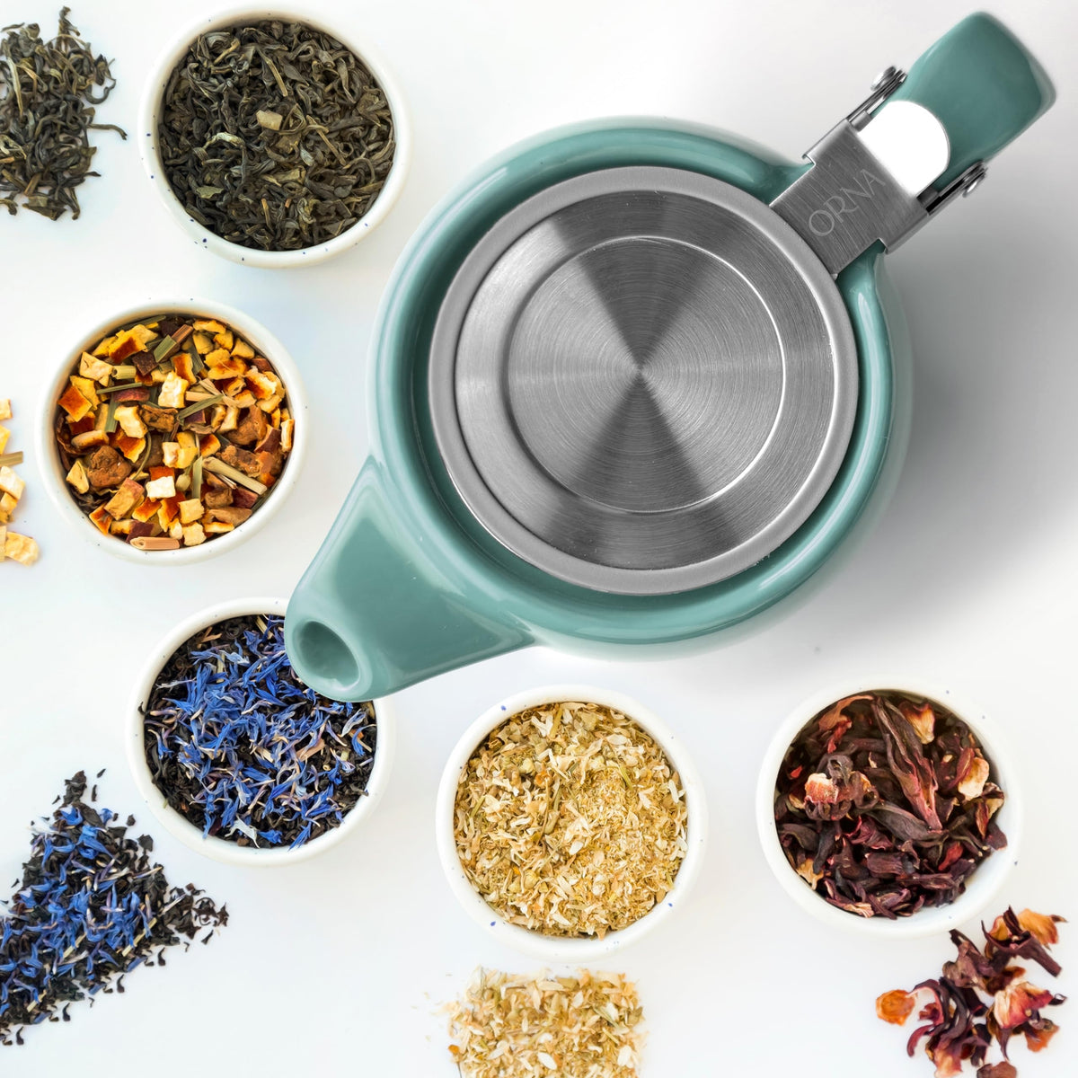 ORNA Ceramic Teapot with Tea Infuser – Small Tea Pot for Loose Leaf Tea – 550ml / 18.6 Oz Non-Stove Porcelain Teapot for 2 Cups with Tea Strainer (Turquoise)